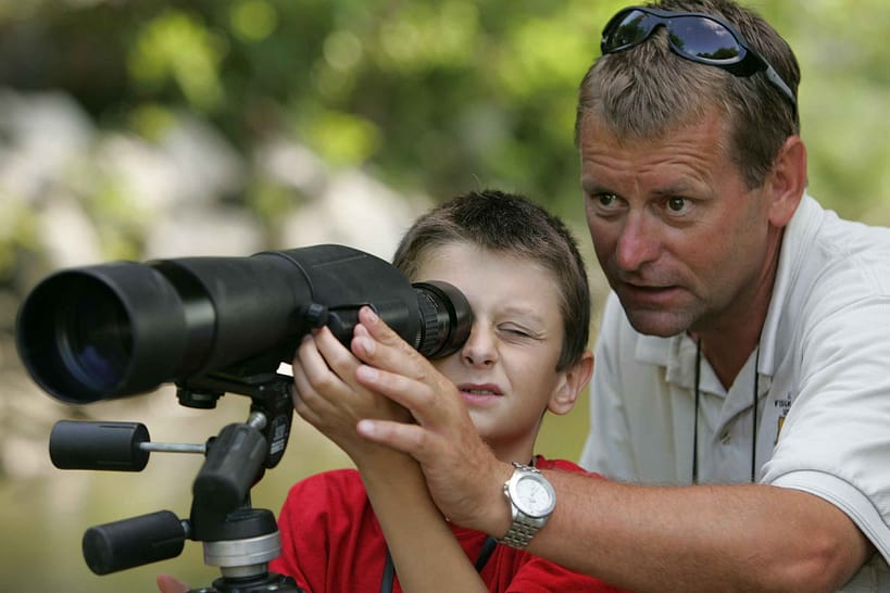 looking through spotting scope